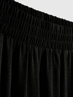 Pantalones de pernera ancha con cintura elástica