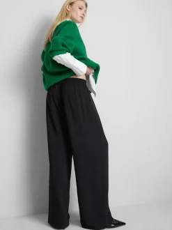 Pantalones de pernera ancha con cintura elástica