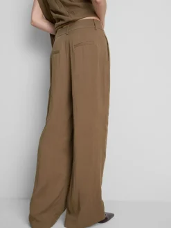 Pantalones de pernera ancha con textura By Coleen