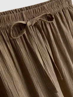 Pantalones de pernera ancha con efecto arrugado