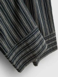 Pantalones de pernera ancha texturizados a rayas