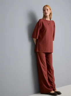 Pantalones de punto plisados de pernera ancha
