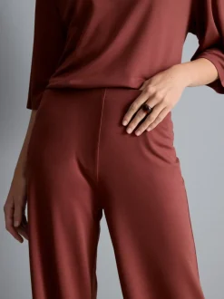 Pantalones de punto plisados de pernera ancha