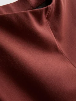 Pantalones de punto plisados de pernera ancha