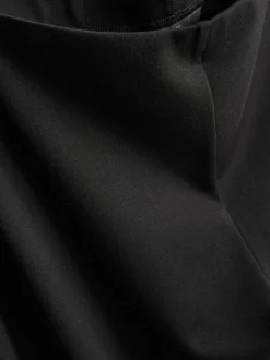 Pantalones de punto plisados de pernera ancha