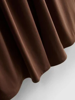 Pantalones drapeados de pernera ancha