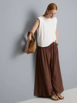 Pantalones drapeados de pernera ancha