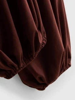 Pantalones harén drapeados