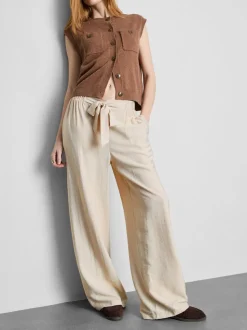 Pantalones palazzo con detalle de lazo