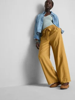 Pantalones palazzo con detalle de lazo