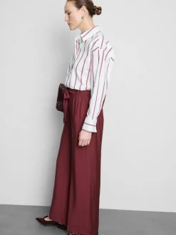 Pantalones palazzo con detalle de lazo