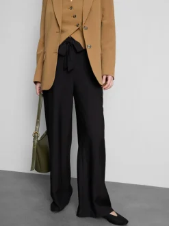 Pantalones palazzo con detalle de lazo