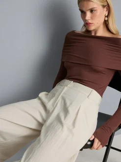 Pantalones plisados fruncidos de pernera ancha