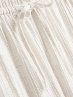Pantalones rectos fruncidos