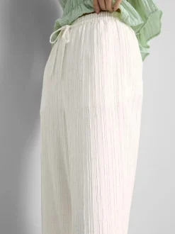 Pantalones rectos fruncidos