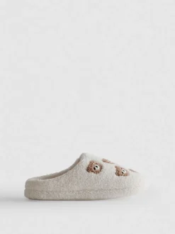 Pantuflas estilo chinela en piel de borrego sintética
