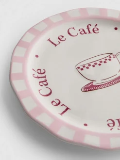 Plato de postre con estampado de cafetería