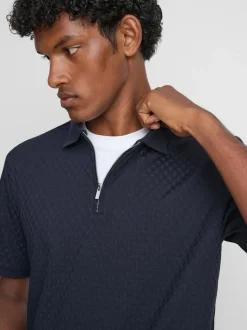 Polo con cremallera y textura de The Edit