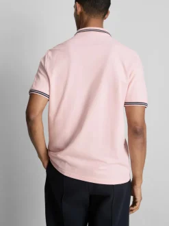 Polo con cuello y ribetes
