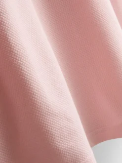Polo con cuello y ribetes