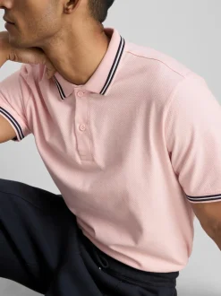 Polo con cuello y ribetes
