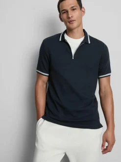 Polo con textura y cuello con cremallera