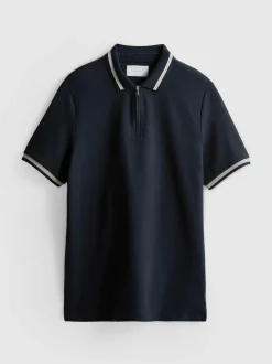 Polo con textura y cuello con cremallera