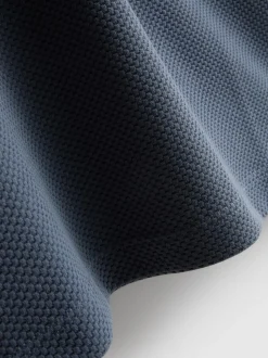 Polo texturizado