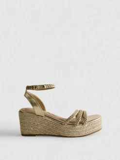 Sandalias de cuña trenzadas