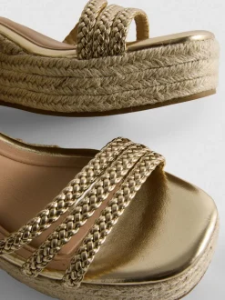 Sandalias de cuña trenzadas