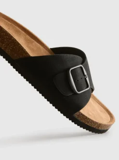 Sandalias destalonadas con tira con hebilla