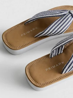 Sandalias de tiras con detalle de nudo