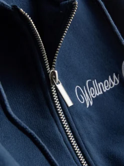 Sudadera con capucha y cremallera estampada