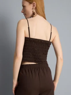 Top bandeau con bajo tipo pañuelo