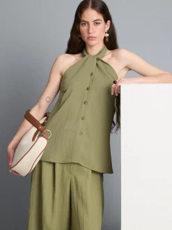 Top con cuello halter, botones y textura