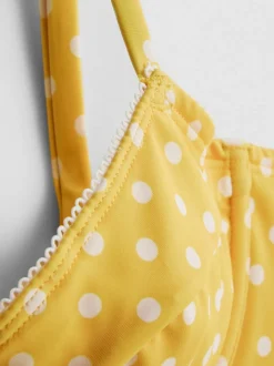 Top de bikini con aros, escote corazón y lunares