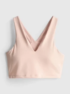 Top deportivo corto con cuello de pico