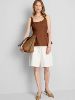 Top formal con péplum en mezcla de lino