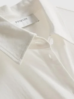 Vestido corto a capas con manga corta