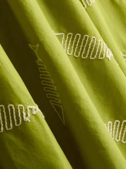 Vestido corto con bordados de peces