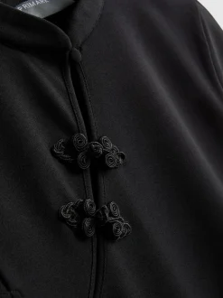 Vestido corto con cuello mao