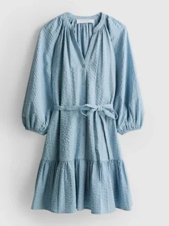 Vestido corto con mangas abombadas