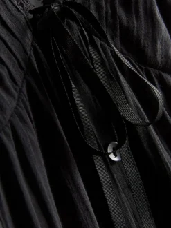 Vestido corto con volantes de Paula Echevarría