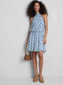 Vestido corto de malla con escote halter y lunares