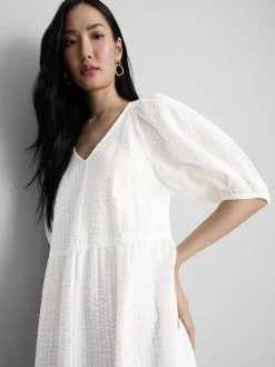 Vestido midi con volantes en sirsaca de algodón