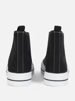 Zapatillas altas de lona con plataforma plana
