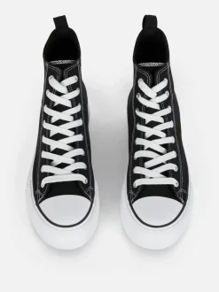 Zapatillas altas de lona con plataforma plana