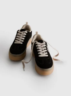 Zapatillas de leopardo con suela gruesa de goma