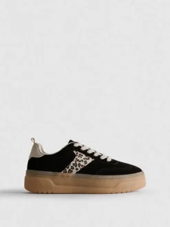 Zapatillas de leopardo con suela gruesa de goma